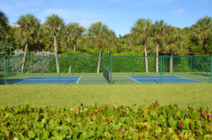 By the sea condo tennis court